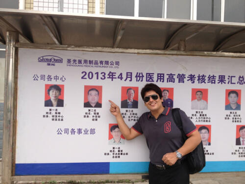 Syed M. Abbas Zaidi pointing at Mr. Stony Cheng (Director Overseas Sales) at manufacturing facility of M/s. Shengguang Medical Instrument Co, Ltd. China (2013)